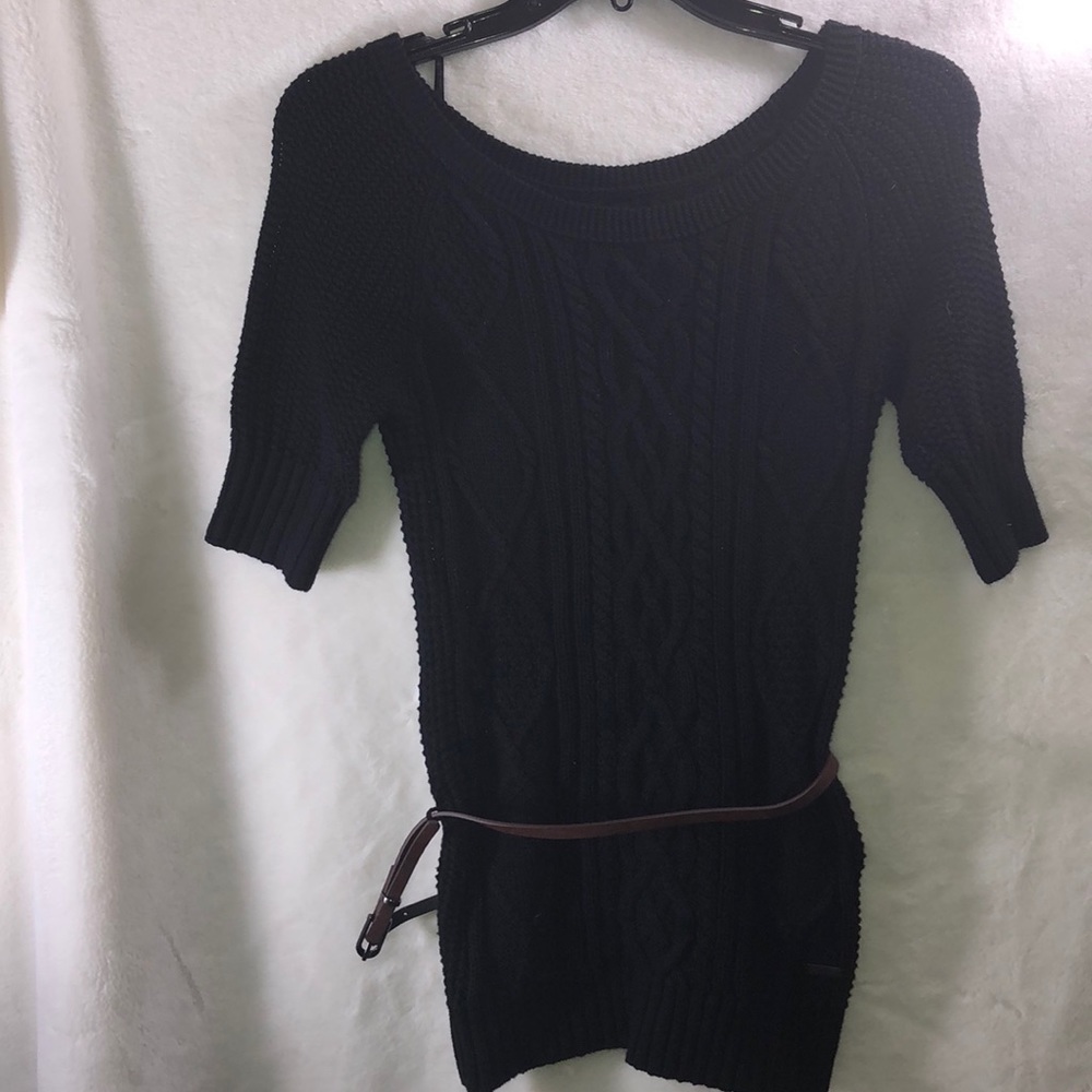 Black Guess cold shoulder sweater.